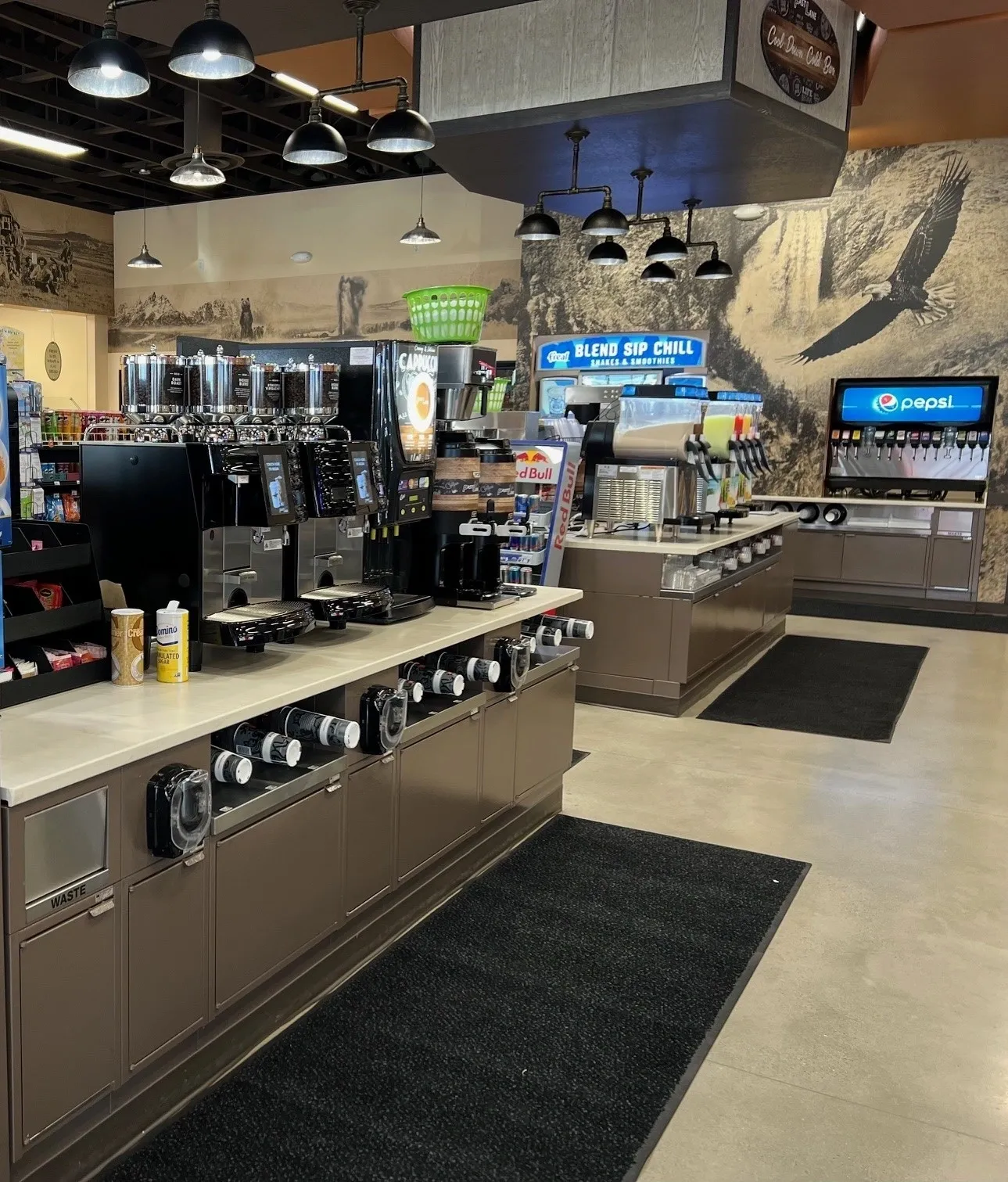 A coffee shop with many machines and counters