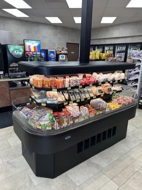 A display case in the middle of an airport.