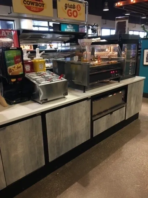 A restaurant kitchen with many different types of food.