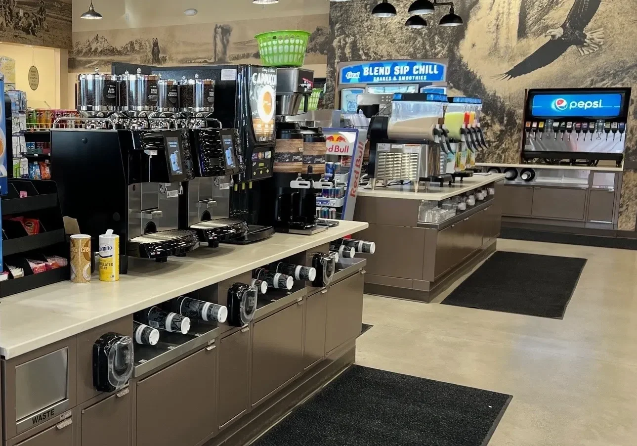 A coffee shop with many machines and counters