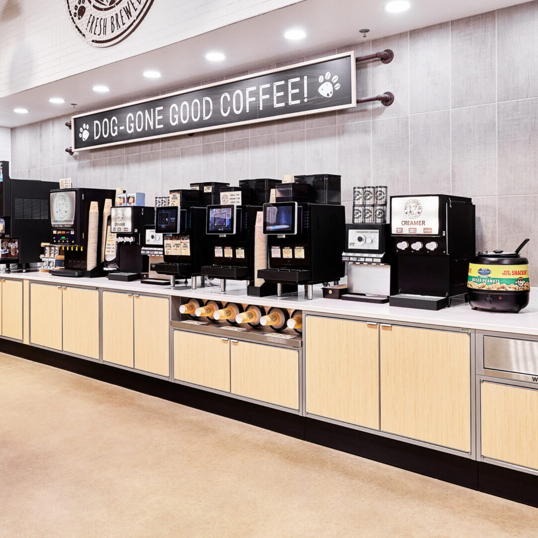 A coffee shop with many machines and counters