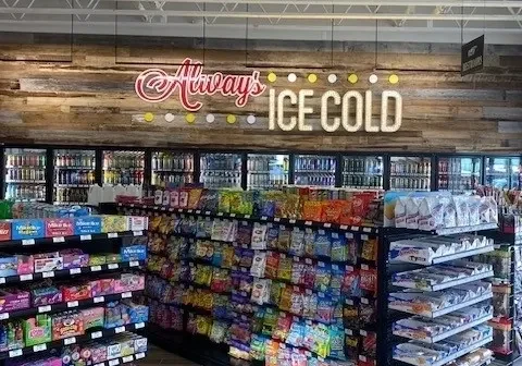 A store with lots of shelves filled with different types of food.