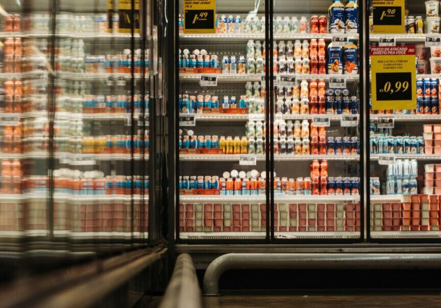 A store with many shelves of beer in it.